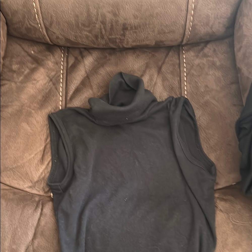 Black Sleeveless Turtleneck Top